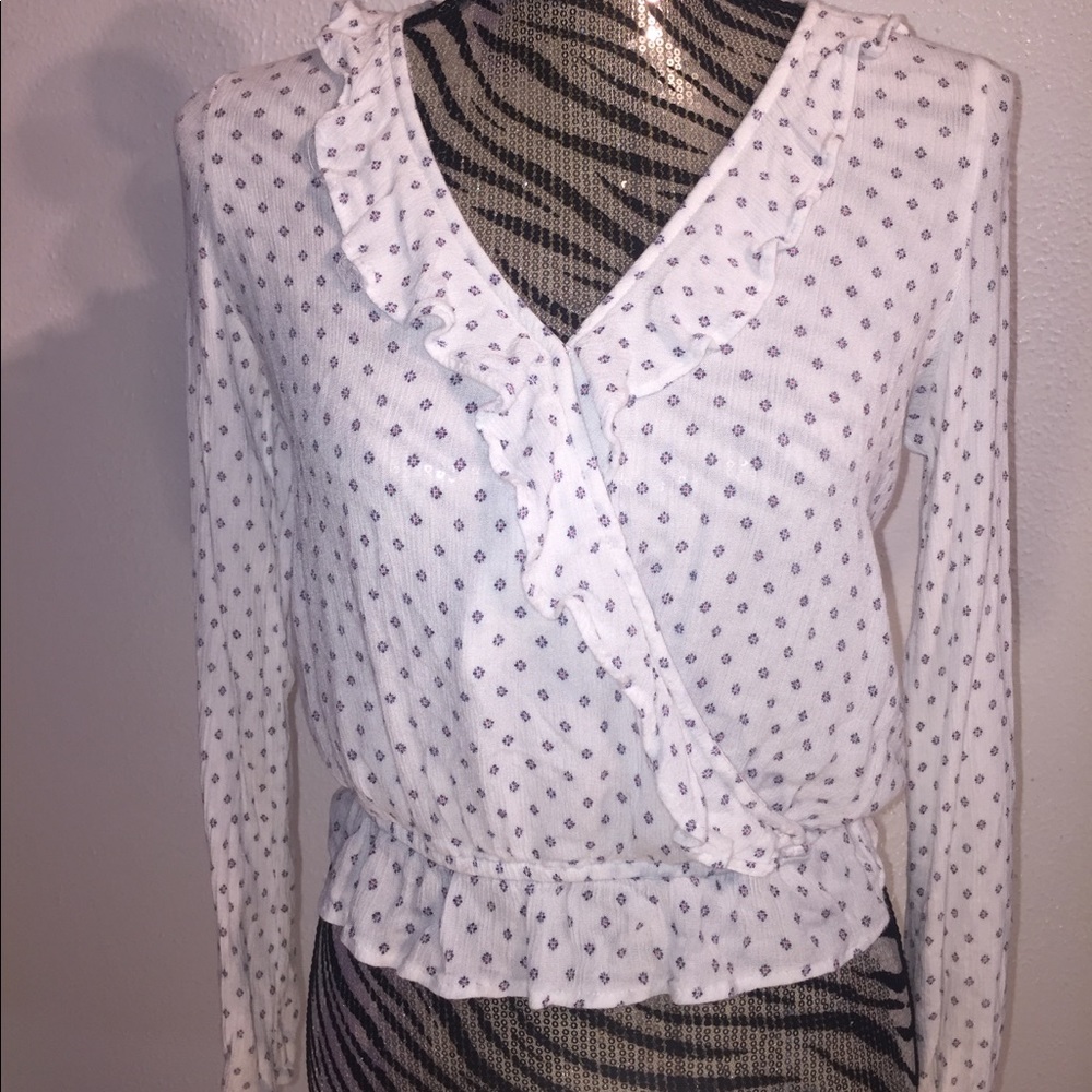 White Blouse with Blue and Pink Details.